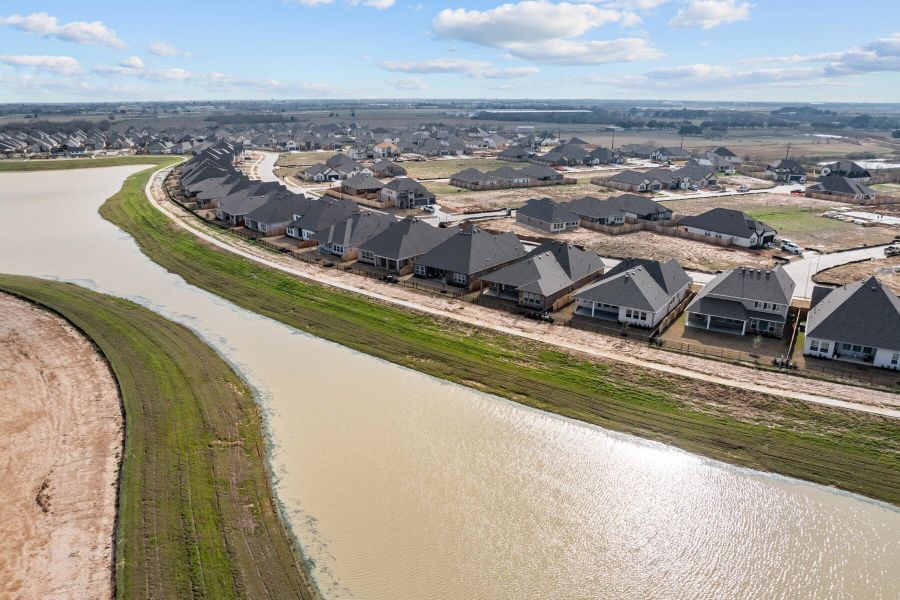 Aerial view of the Oakwood Estates community in Waller, TX, showing layout and nearby surroundings (Image 4). Aerial view of the Oakwood Estates community in Waller, TX, showing layout and nearby surroundings (Image 4).
