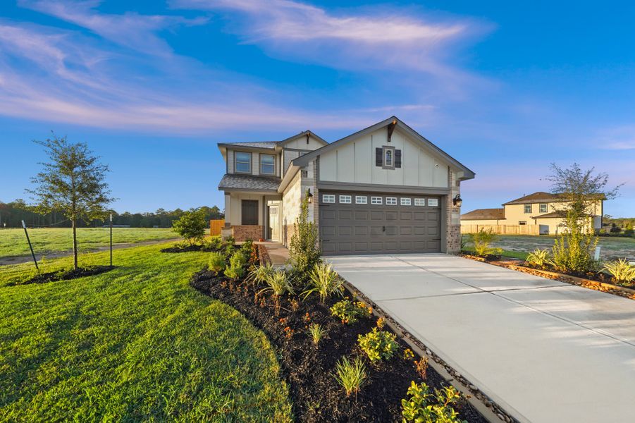 Front exterior of a home in the Granger Pines community, located in Conroe, TX (Image 2).
