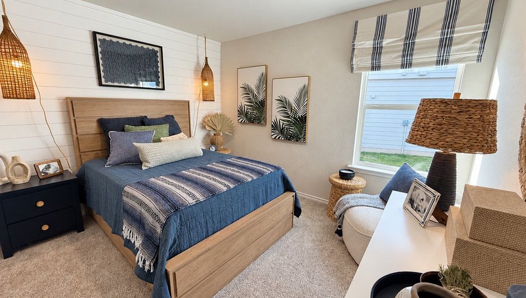 Furnished interior in a model home at Redbird Ranch in San Antonio (Image 56).