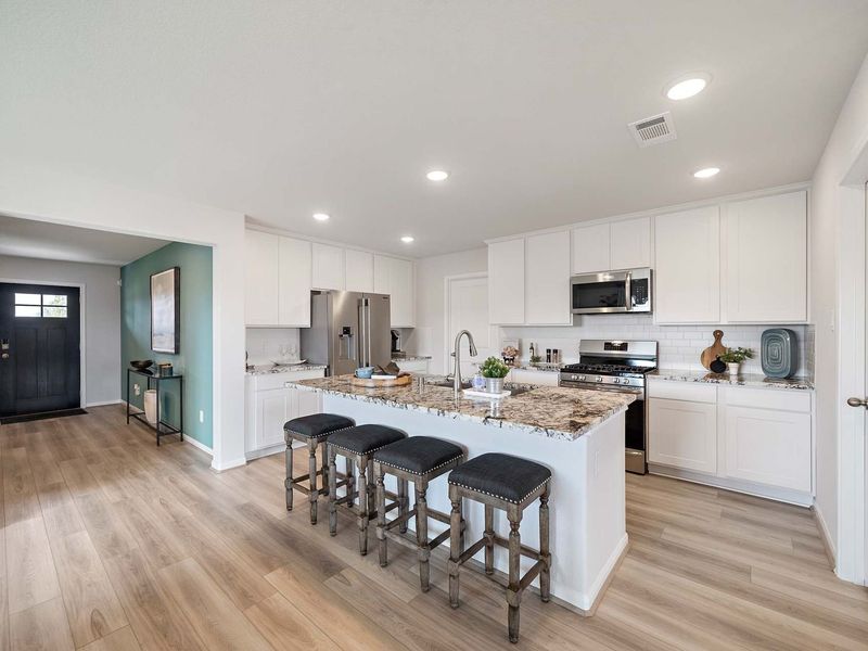 Furnished interior in a model home at Sunterra in Katy (Image 7).