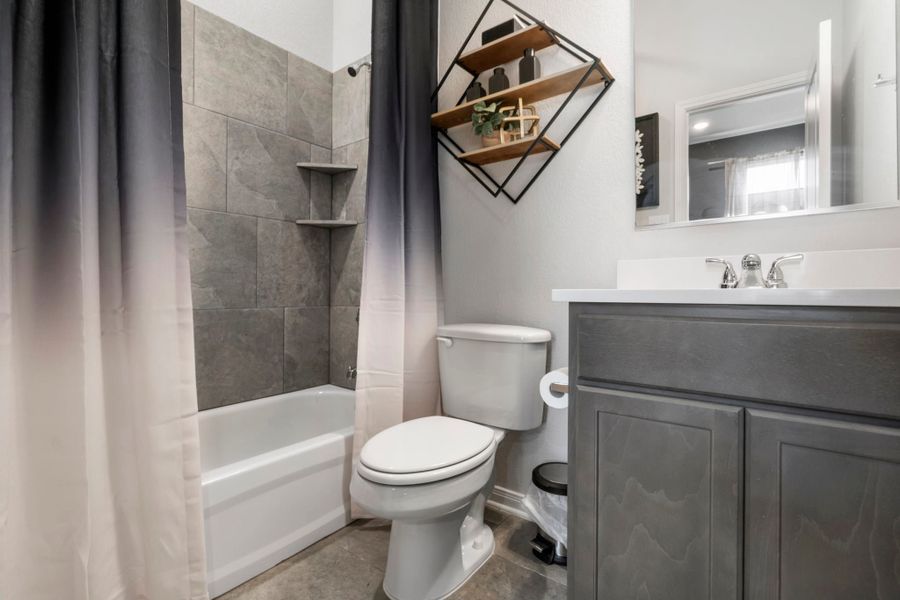 Furnished interior in a model home at Legacy at Park Meadows in Lorena (Image 9).