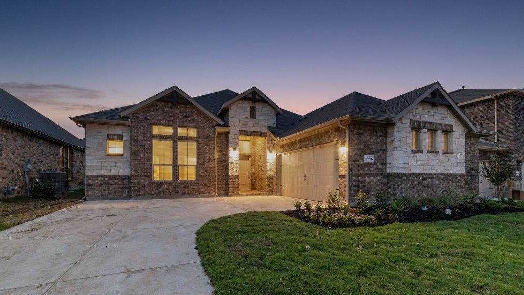 Front exterior of a home in the Eden Ranch community, located in Arlington, TX (Image 10).