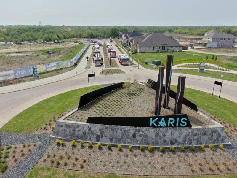 Entrance to the Karis community in Crowley, TX, featuring signage and landscaping (Image 2). Entrance to the Karis community in Crowley, TX, featuring signage and landscaping (Image 2).