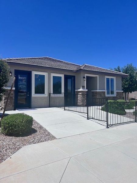 A modern single-story home with a fenced yard in The Views at Rancho Cabrillo by Scott Communities (Peoria, AZ).