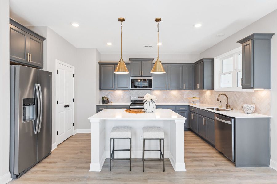 Furnished interior in a model home at Anchors Bend Townes in Wilmington (Image 25).