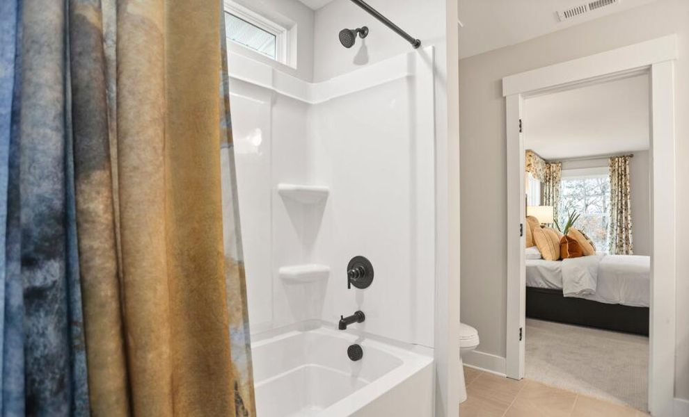 Furnished interior in a model home at Carraway in Greensboro (Image 29).