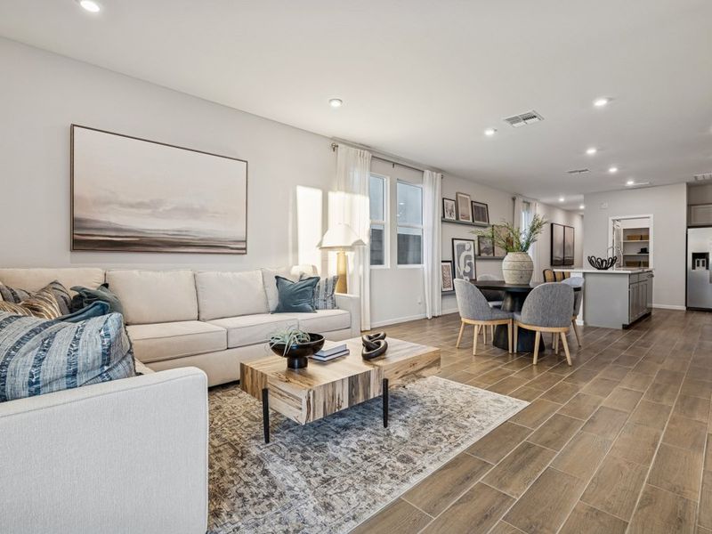 A living room with a couch and a coffee table.