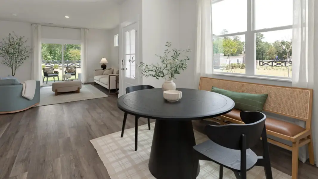 Furnished interior in a model home at The Retreat at Indigo Preserve Townhomes in Leland (Image 23).