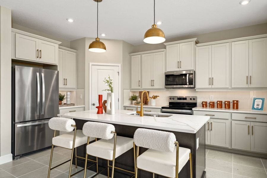 Furnished interior in a model home at Rainwood in Groveland (Image 4).