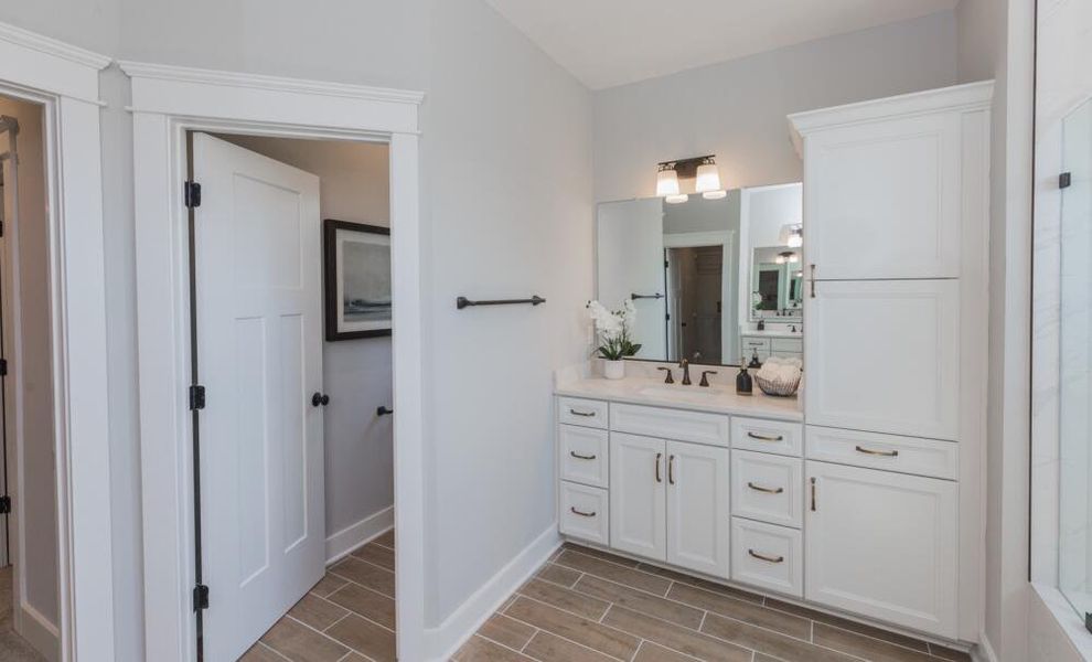 Furnished interior in a model home at Peyton's Creek in Statesville (Image 23).