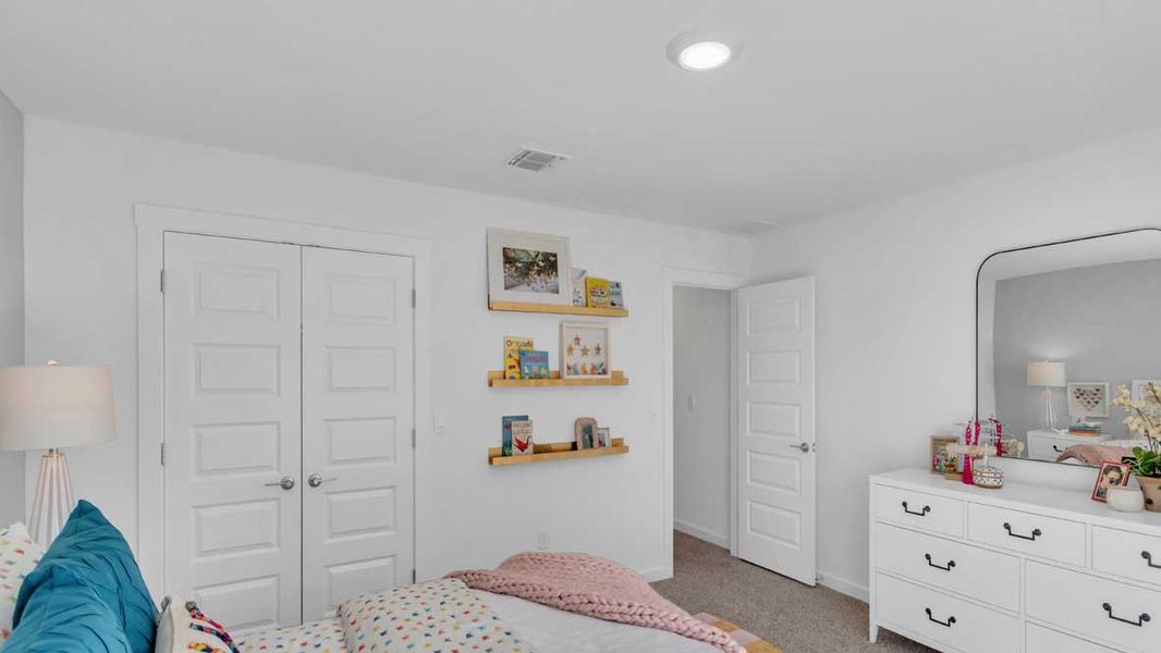 Furnished interior in a model home at Rosenbusch Ranch in Leander (Image 47).