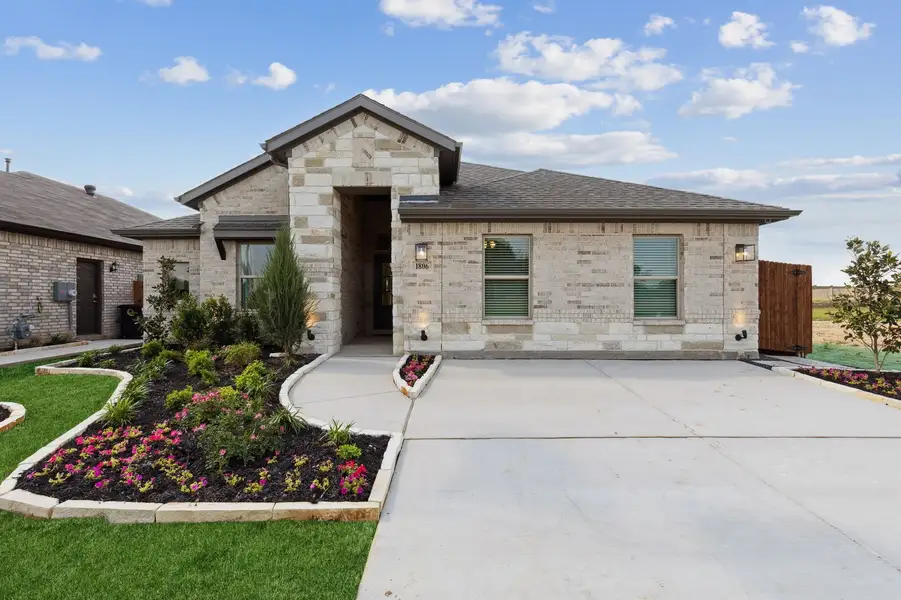 Front exterior of a home in the Baker Farms community, located in Cleburne, TX (Image 1). Front exterior of a home in the Baker Farms community, located in Cleburne, TX (Image 1).