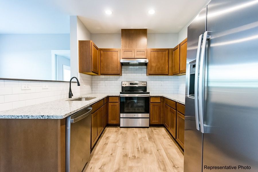 Furnished interior in a model home at Academy Overlook in Clayton (Image 7).