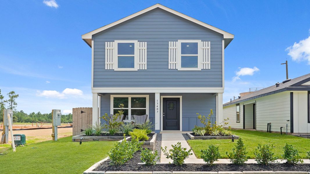 Front exterior of a home in the Castles Edge community, located in Willis, TX (Image 3).