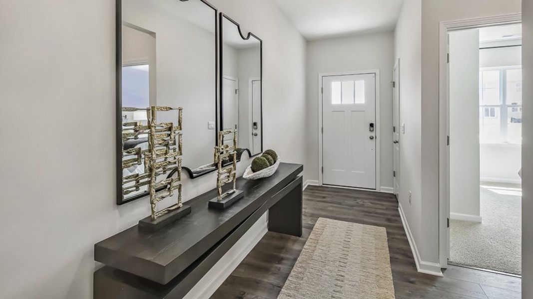 Furnished interior in a model home at The Reserve at Prestleigh in Wake Forest (Image 53).