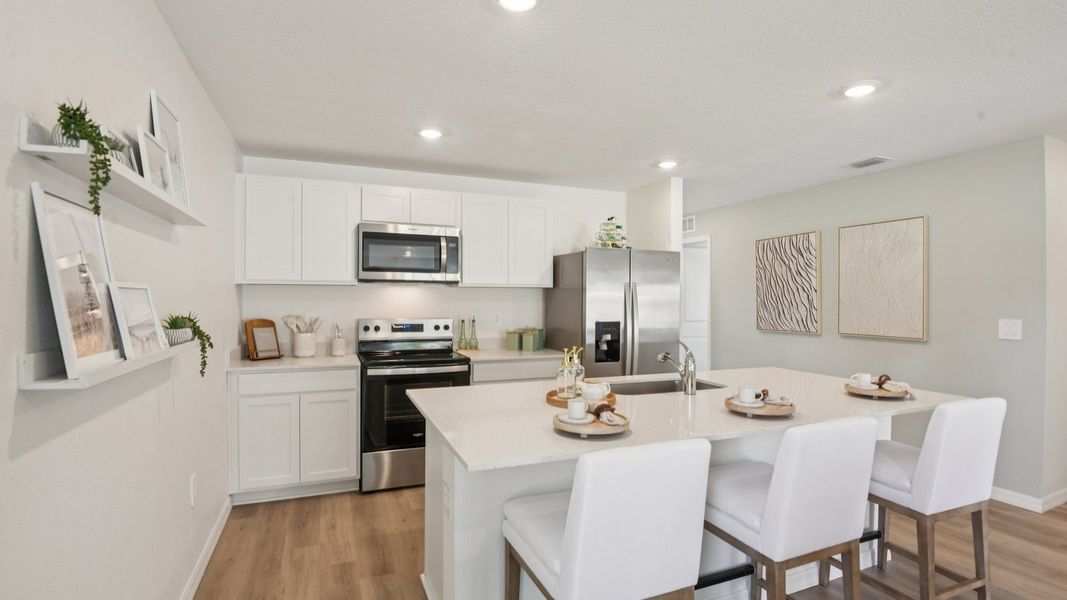 Furnished interior in a model home at Brighton Park in Hudson (Image 16).