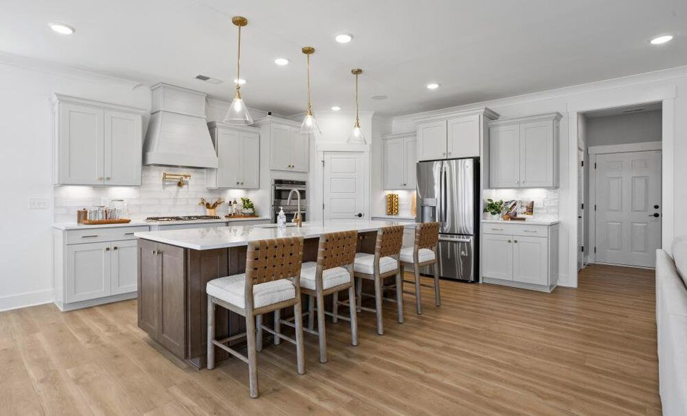 Furnished interior in a model home at The Enclave at Hidden Lake - 55+ Community in Youngsville (Image 7).