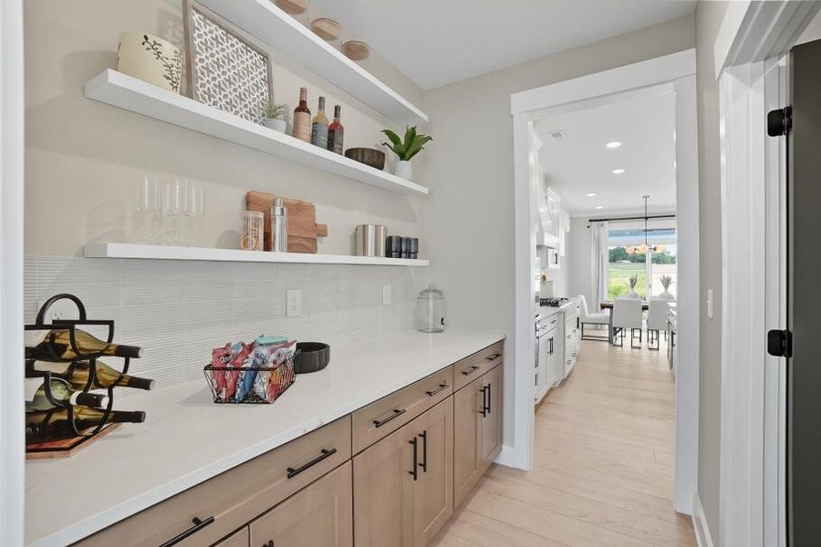 Furnished interior in a model home at Carrington in Stanley (Image 27).