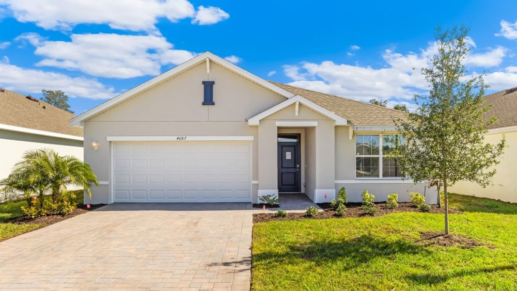 Front exterior of a home in the Cape Coral Water & Sewer community, located in Cape Coral, FL (Image 8).
