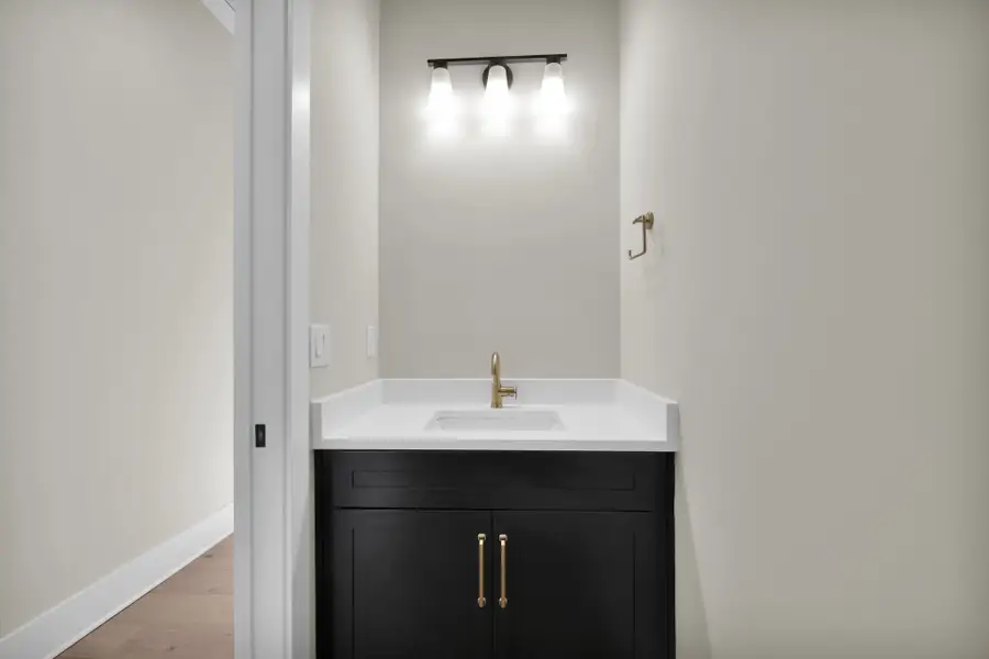 Furnished interior in a model home at Hidden Creek at SilverLeaf in St. Augustine (Image 3).