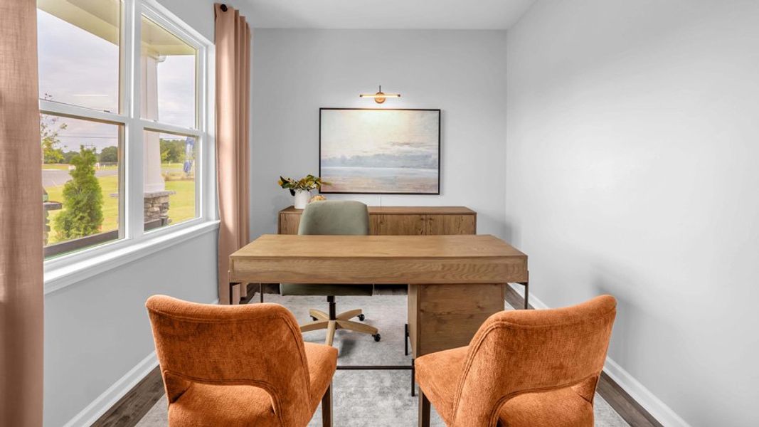 Furnished interior in a model home at Shahbain Reserve in Raeford (Image 5).