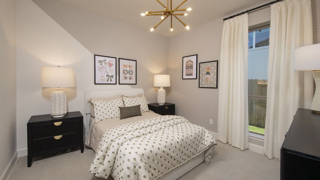 Furnished interior in a model home at Cross Creek West 45' in Fulshear (Image 18).