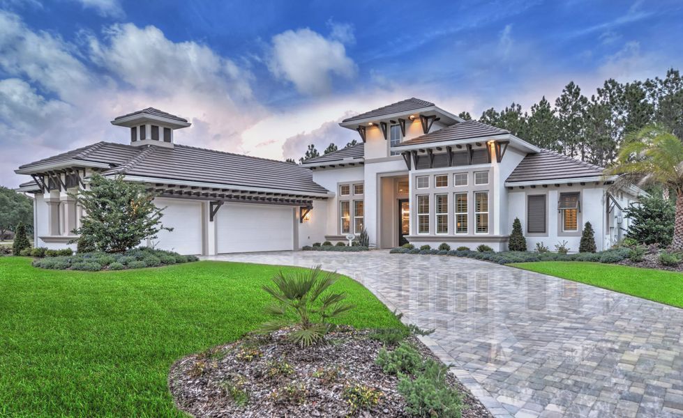 Front exterior of a home in the The Conservatory at Hammock Beach community, located in Palm Coast, FL (Image 3).