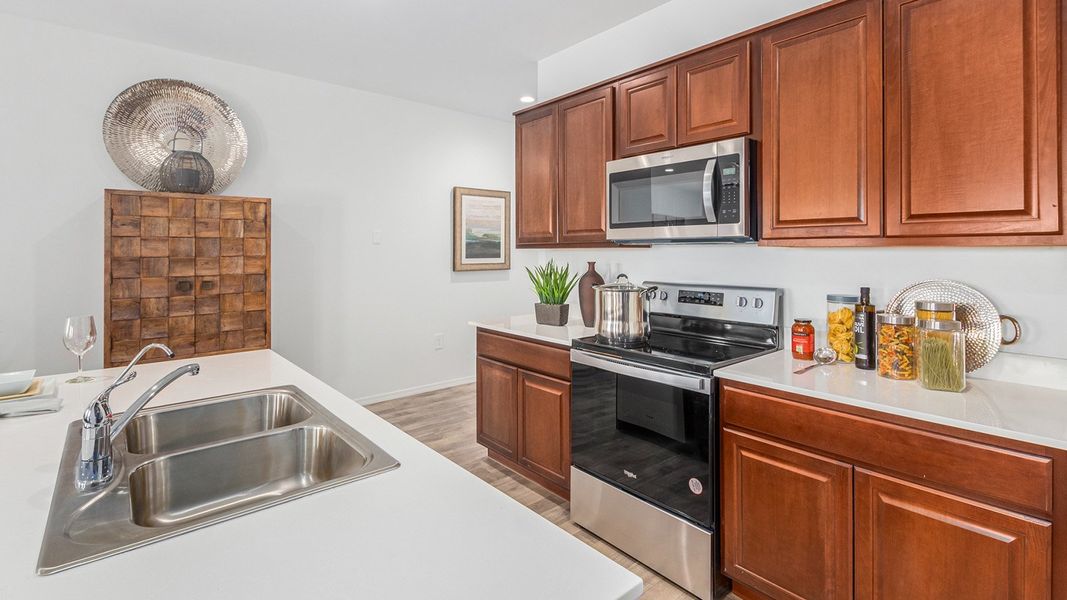 Furnished interior in a model home at Roadrunner Estates in Tucson (Image 22).