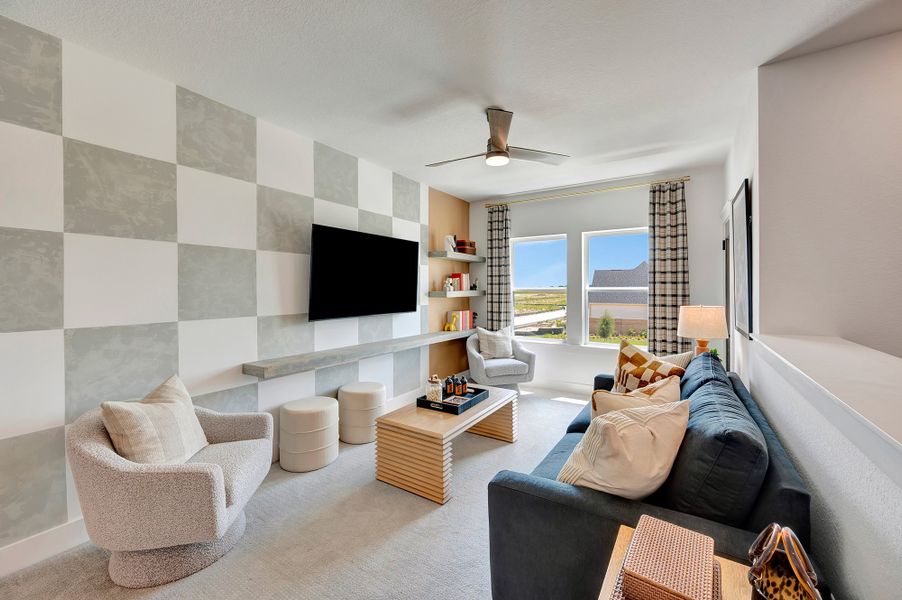 Furnished interior in a model home at Bridgeland Central: Emerald Heights - Enclave Collection in Cypress (Image 16).