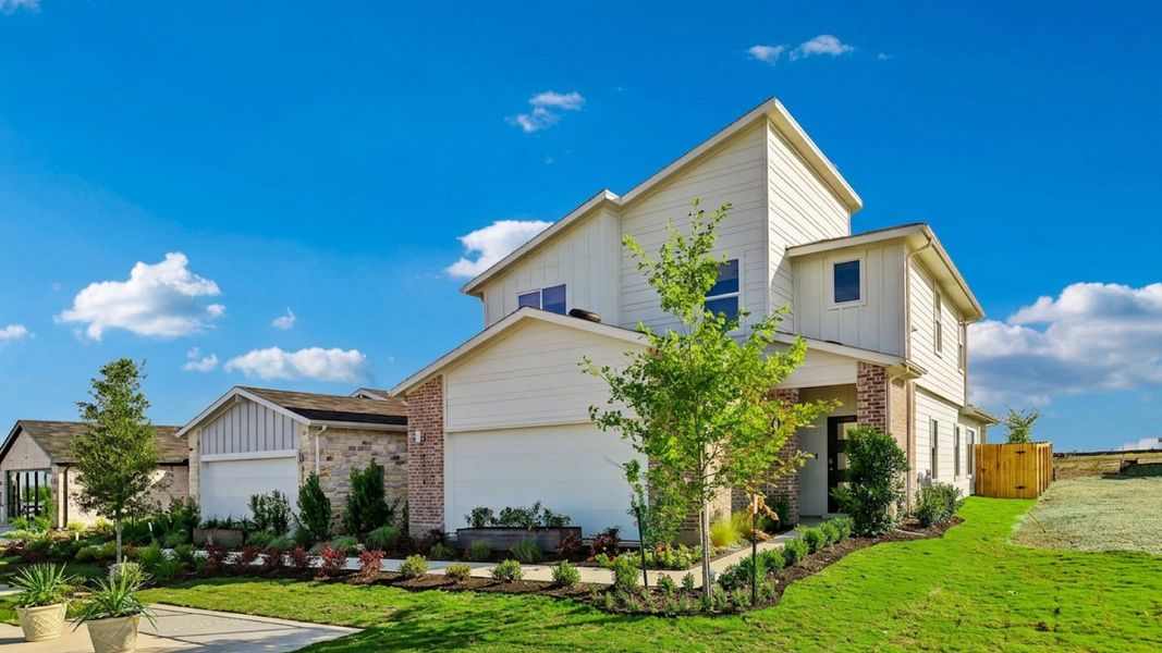 Front exterior of a home in the Frontier community, located in Mustang Ridge, TX (Image 3).