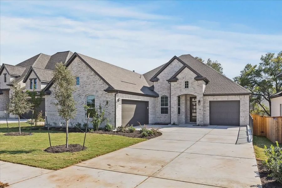 Front exterior of a home in the Gregg Ranch community, located in Marble Falls, TX (Image 5). Front exterior of a home in the Gregg Ranch community, located in Marble Falls, TX (Image 5).