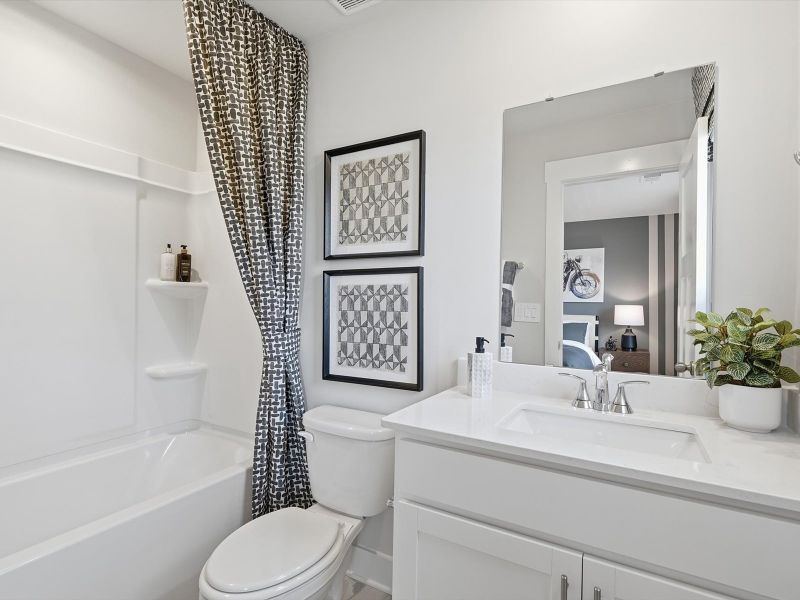 Furnished interior in a model home at Crossing at Abner Creek in Greer (Image 18).
