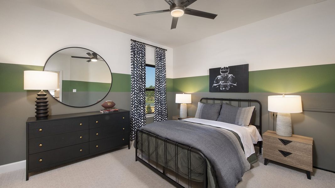 Furnished interior in a model home at Cross Creek West 55' in Fulshear (Image 22).