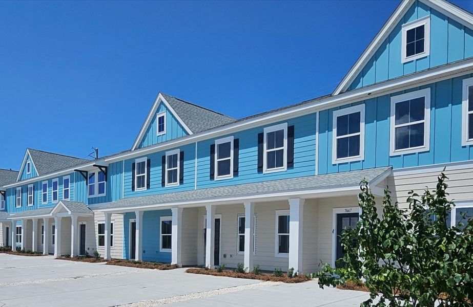 Front exterior of a home in the Waypoint Townhomes community, located in Panama City Beach, FL (Image 4).