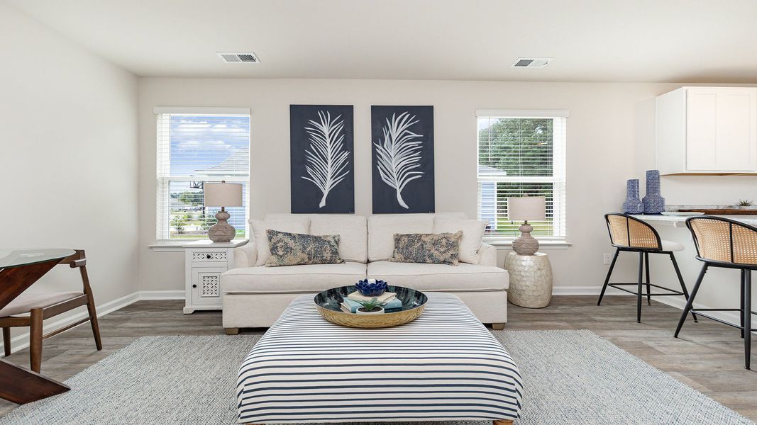 Furnished interior in a model home at Silver Oaks in Ocean Isle Beach (Image 6).