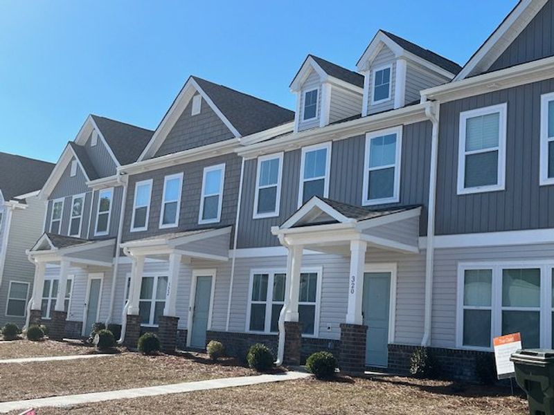 Charming townhomes with modern designs in North Creek at Nexton by True Homes (Summerville, SC).