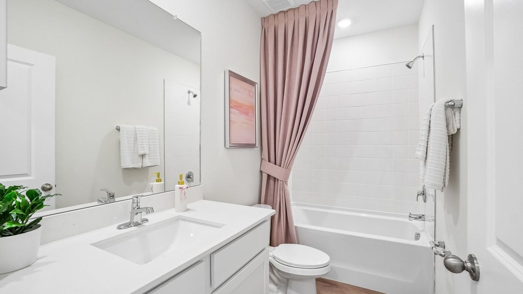 Furnished interior in a model home at Sanctuary at Citrus Park Townhomes in Tampa (Image 20).