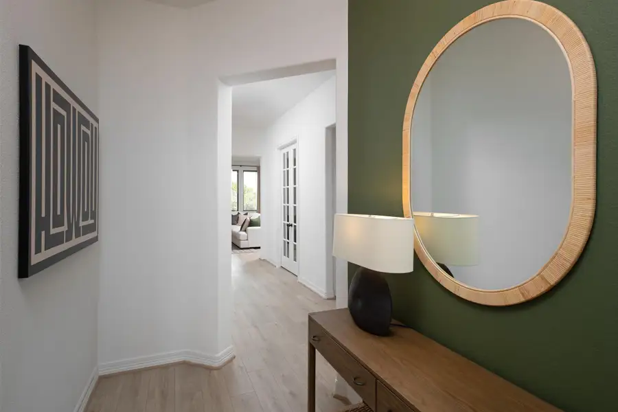 Furnished interior in a model home at Brookewater in Rosenberg (Image 6).