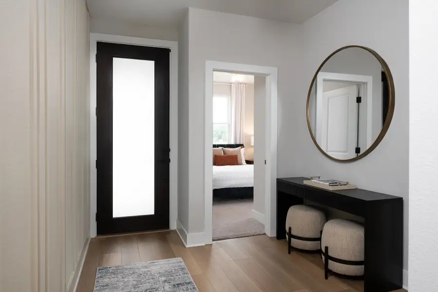 Furnished interior in a model home at Cannon Ranch in Dripping Springs (Image 4).