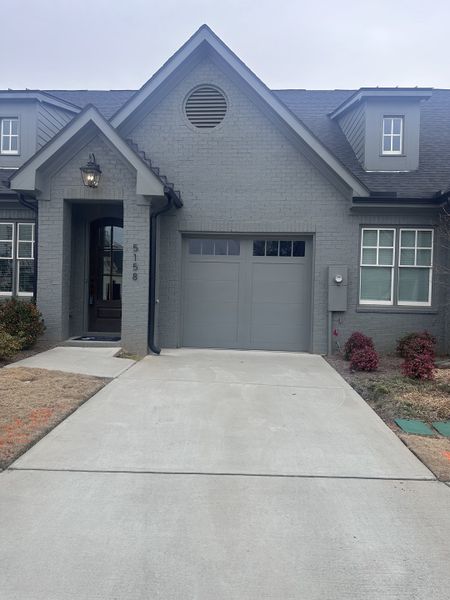A charming gray brick home with classic design in Cottages at Noble Village by Seed Capital Investments, LLC (Lilburn, GA). A charming gray brick home with classic design in Cottages at Noble Village by Seed Capital Investments, LLC (Lilburn, GA).