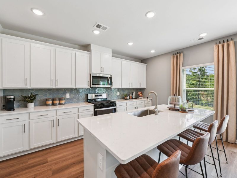 Furnished interior in a model home at Avalon Place - Signature Series in Durham (Image 2).