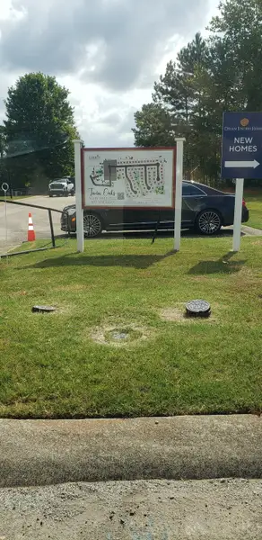 A scenic entrance to Twin Oaks by Dream Finders Homes, highlighting new homes available in Villa Rica, GA. A scenic entrance to Twin Oaks by Dream Finders Homes, highlighting new homes available in Villa Rica, GA.