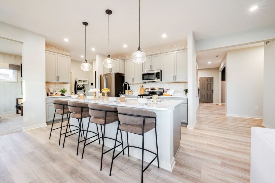 Furnished interior in a model home at Crossvine Estates in Hoschton (Image 7).