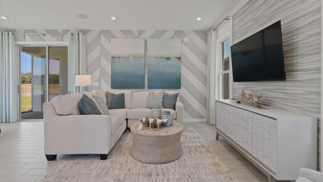 Open living room space with natural lighting at DRB homes