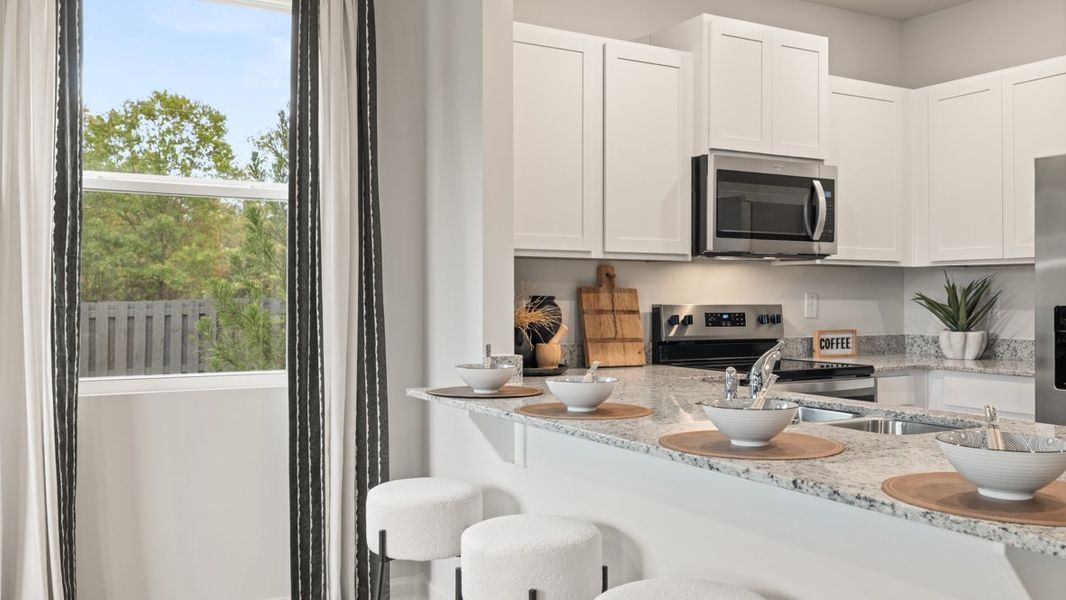 Furnished interior in a model home at Woodbury Park in Atlanta (Image 11).