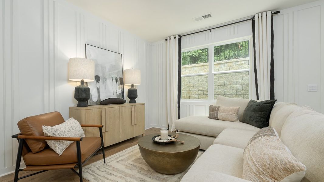 Furnished interior in a model home at Wellington Park in Lithonia (Image 8).