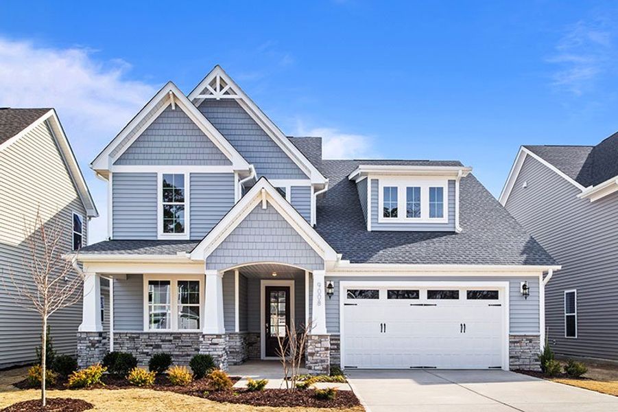 Front exterior of a home in the WyndWater community, located in Hampstead, NC (Image 13).