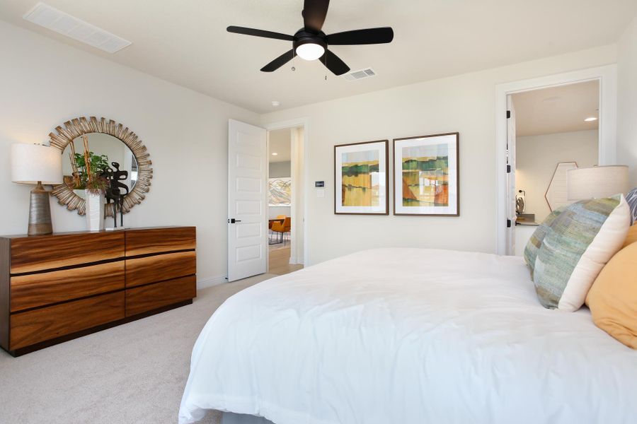 Furnished interior in a model home at Casetta Ranch in Kyle (Image 11).