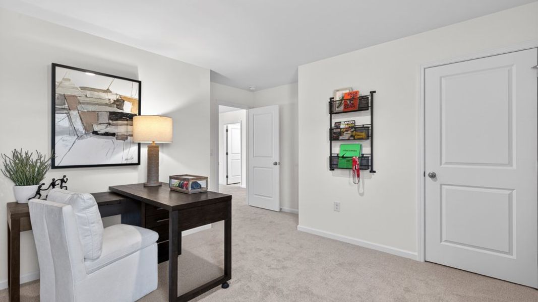 Furnished interior in a model home at The Grove at Winston Pointe in Clayton (Image 27).