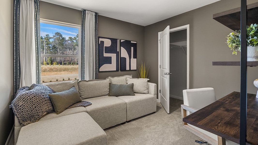 Furnished interior in a model home at Waypoint in Flowery Branch (Image 31).